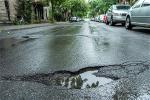 damage-pothole-in-road